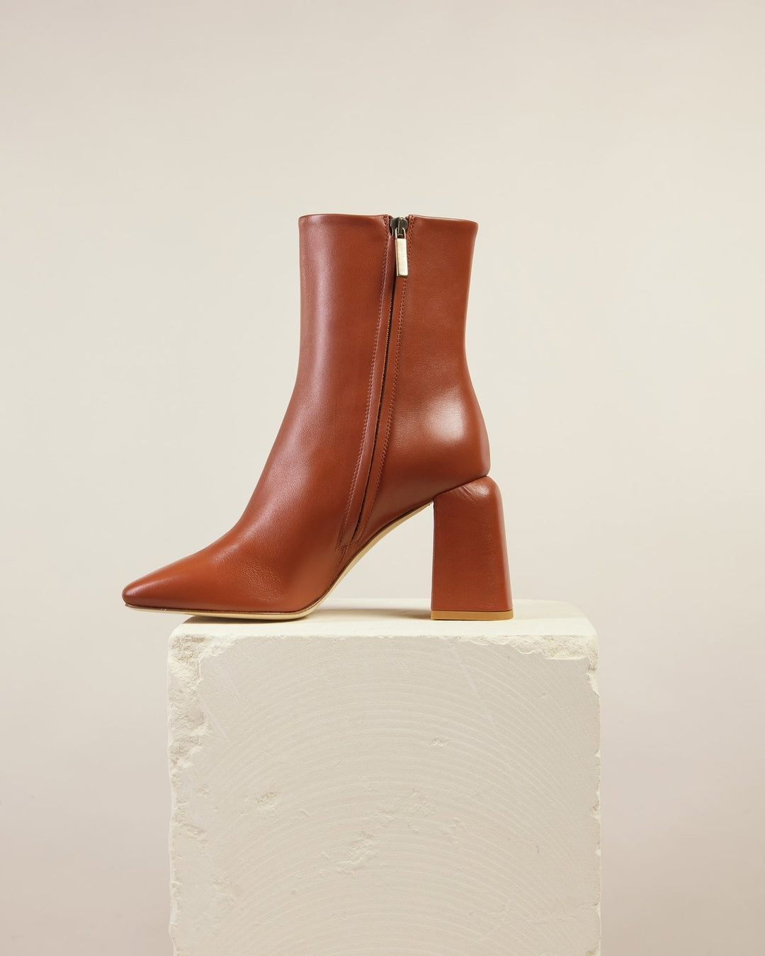 A true outfit elevator, the Imani boots are elegantly crafted with a snug, high ankle silhouette and wrapped leather heel. Restrained and refined reflecting Jane Frances’s minimalist vision, each pair is made in buttery soft leather for timeless style, whatever the occasion.