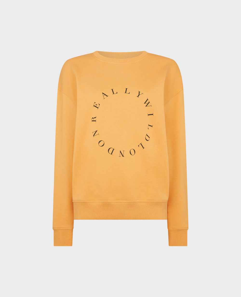 Our Really Wild logo print sweatshirt comes in 100% organic cotton and in orange. Perfect for pairing with denim.