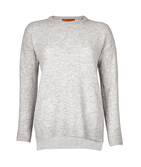 A luxuriously soft British-spun lambswool jumper has a relaxed fit, drop shoulder ribbed detail and features a mix of dyed and undyed yarn, bringing out a beautiful marled effect.