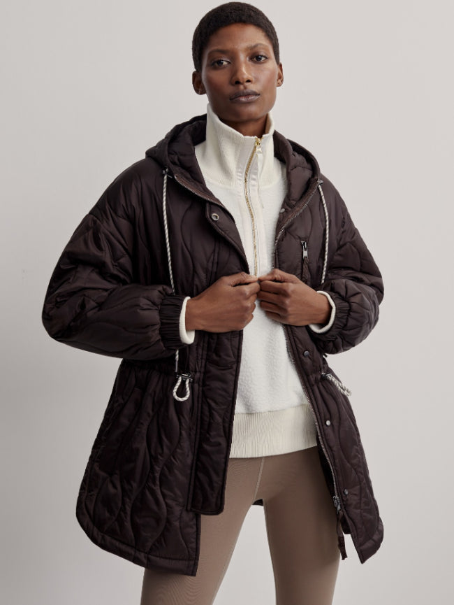 Made from a light lustre, soft quilted ripstop, this jacket is an elevated everyday layer.