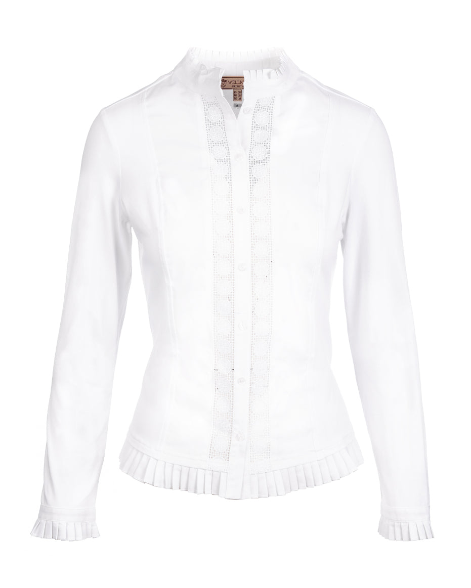 Our Phoebe White Frill Shirt is a one of our favourite pieces as they are a smart casual comfortable white shirt. The buttoned front shapes the shirt beautifully and the cotton stretch on the back and sides ensures ultimate comfort. The intricate lace detailing on the front and the frill to the cuff, collar and bottom is essentially feminine. Looks great under one of our wool jackets over jeans or tucked into a skirt.