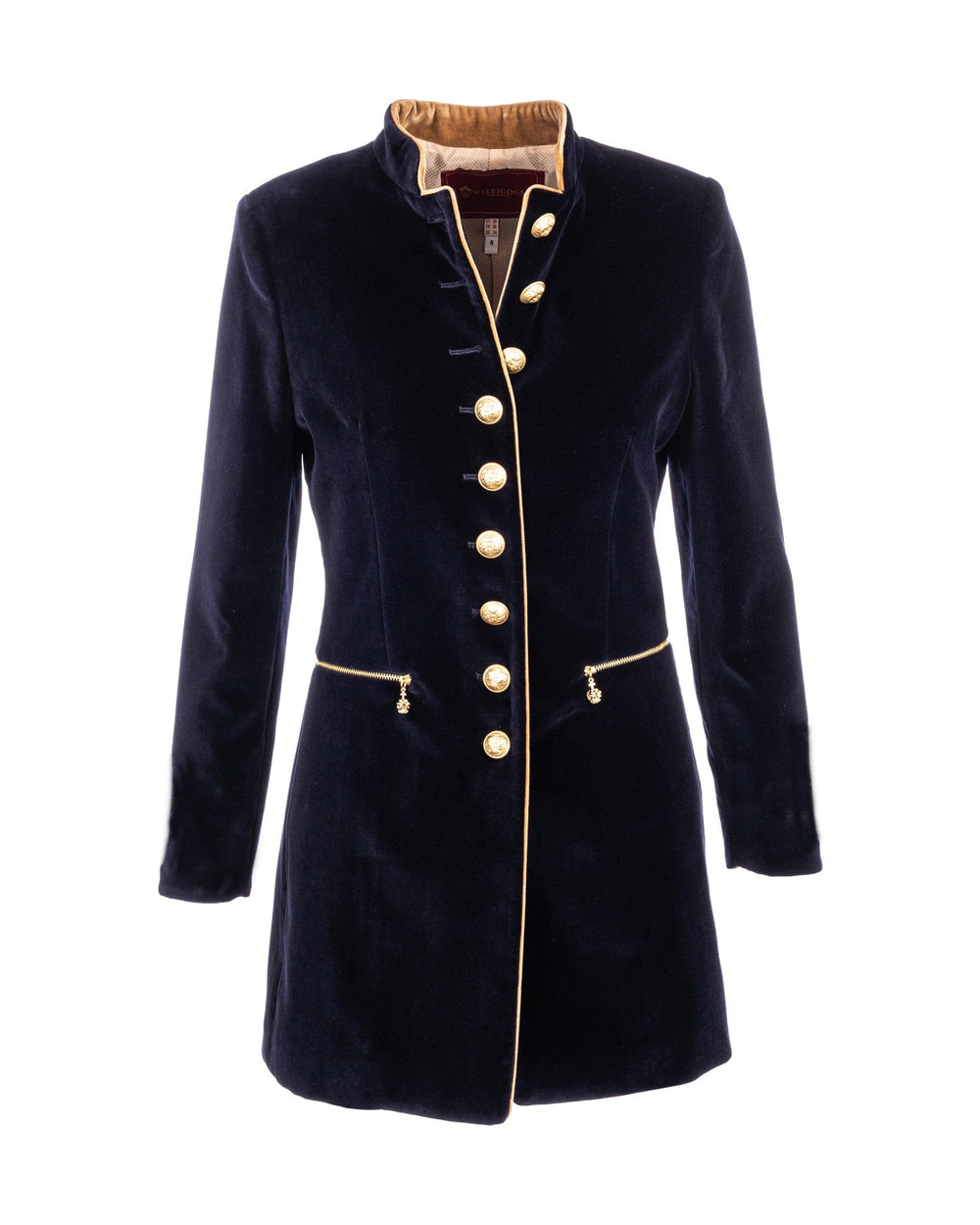 Our Seville Navy Velvet Coat is a tailored dream. The tan piping detailing and muted gold buttons contrast beautifully with the navy velvet, and the inside cuffs reveal exquisite pops of colour. The zipped pockets with crown charms are playful and the mid length style is refined. We think this coat pairs beautifully with the Phoebe Gold Shirt and Brooklyn Navy Boots.